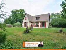 Idéal famille : spacieuse maison avec grand terrain arboré à Sylvain-les-Moulins