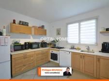 Maison 97 m² avec 4 chambres, grand terrain et garage indépendant