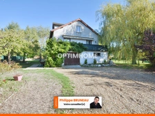 Maison 97 m² avec 4 chambres, grand terrain et garage indépendant