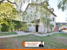 Maison 97 m² avec 4 chambres, grand terrain et garage indépendant