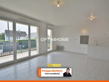Un appartement prêt à vivre avec balcon et stationnement privatif