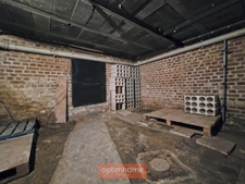 MAISON INDIVIDUELLE – 3 CHAMBRES – JARDIN – GARAGE + 5 GARAGES LOUÉS