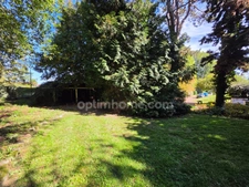 MAISON INDIVIDUELLE SEMI PLAIN-PIED 5 CHAMBRES SOUS-SOL COMPLET JARDIN