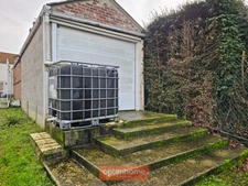 MAISON INDIVIDUELLE – 3 CHAMBRES – JARDIN – GARAGE + 5 GARAGES LOUÉS