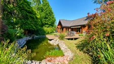 MAISON EN BOIS MASSIF HONKA 175 m² SEMI PLAIN-PIED AVEC BEAU JARDIN