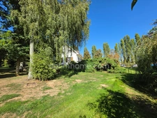 MAISON INDIVIDUELLE SEMI PLAIN-PIED 5 CHAMBRES SOUS-SOL COMPLET JARDIN