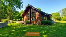 MAISON EN BOIS MASSIF HONKA 175 m² SEMI PLAIN-PIED AVEC BEAU JARDIN