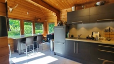 MAISON EN BOIS MASSIF HONKA 175 m² SEMI PLAIN-PIED AVEC BEAU JARDIN