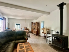 Maison en pierre 180 m² + dépendance 80 m², garage 45 m² et jardin de 1 400 m²