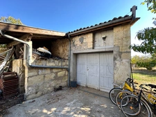 Maison en pierre 180 m² + dépendance 80 m², garage 45 m² et jardin de 1 400 m²