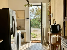 Maison en pierre 180 m² + dépendance 80 m², garage 45 m² et jardin de 1 400 m²