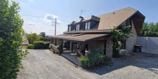🏡 Coup de cœur à la campagne – Belle maison familiale 6 pièces de 140 m² avec véranda chauffée, dépendances, garages et jardin