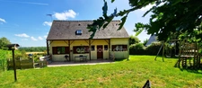 Maison bois contemporaine 125 m², Terrain de 1600 m² – DPE A – 4/5 ch. + sous-sol – Plein Sud