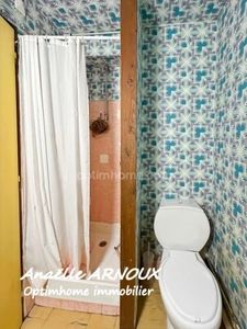 Duplex à rénover avec balcon et grand garage