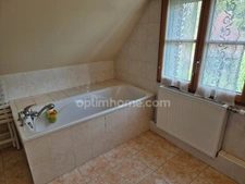 Maison individuelle 4ch semi plain pied jardin garage
