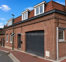 Maison centre ville en semi plain pied avec jardin et garage