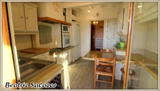 Belle maison de 100 m² partiellement à rénover. 4 pièces, véranda, garage, 2 celliers, atelier et abri voiture sur 6300 m² de terrain.