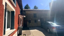 Villecloye maison 3 chambres avec grange, atelier, garage et beau terrain. 