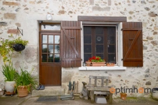 Belle maison en pierre avec grand jardin