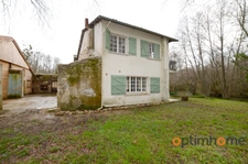 Propriété de 4 chambres au bord de la rivière à vendre
