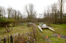 Propriété de 4 chambres au bord de la rivière à vendre