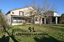 Maison de caractère à Puygouzon – Idéale pour conjuguer vie familiale et projet professionnel !