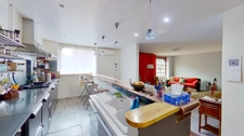 Bien rare aux portes de Paris – Appartement mixte de plein pied à usage d’habitation avec jardin privatif