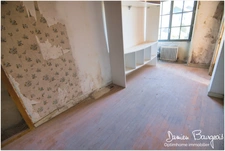 Maison mitoyenne brute avec fort potentiel d'environ 84 m² (110 m2 sol)