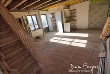 Maison mitoyenne brute avec fort potentiel d'environ 84 m² (110 m2 sol)