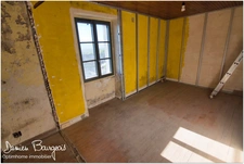 Maison mitoyenne brute avec fort potentiel d'environ 84 m² (110 m2 sol)