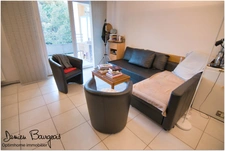 Appartement T2 de 53.33 m² avec terrasse, double parking souterrain – Centre-ville de Gex