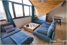 Duplex en dernier étage de 146 m² (208 m² au sol) avec double garage et cave