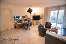 Appartement T2 de 53.33 m² avec terrasse, double parking souterrain – Centre-ville de Gex