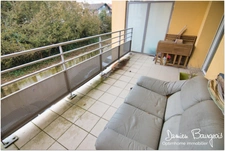 Appartement T2 de 53.33 m² avec terrasse, double parking souterrain – Centre-ville de Gex