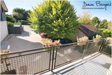 Appartement T4 avec balcon, véranda et 2 places de parking – Centre de Ségny