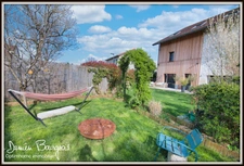Superbe grange rénovée avec raffinement offrant 181 m² sur un terrain arboré de 370 m²