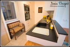 Élégant appartement T2 de 50 m2 en rez-de-jardin avec terrasse, vaste jardin, garage fermé et stationnement privé