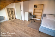 Duplex en dernier étage de 146 m² (208 m² au sol) avec double garage et cave