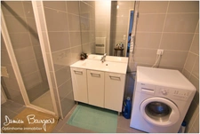 Appartement T2 de 53.33 m² avec terrasse, double parking souterrain – Centre-ville de Gex