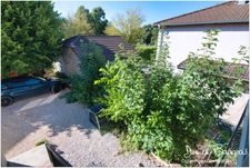 Appartement T4 avec balcon, véranda et 2 places de parking – Centre de Ségny