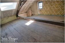 Maison mitoyenne brute avec fort potentiel d'environ 84 m² (110 m2 sol)