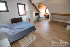 Duplex en dernier étage de 146 m² (208 m² au sol) avec double garage et cave