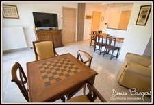 Élégant appartement T2 de 50 m2 en rez-de-jardin avec terrasse, vaste jardin, garage fermé et stationnement privé