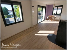 Appartement T4 avec balcon, véranda et 2 places de parking – Centre de Ségny