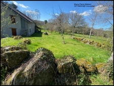 Maison mitoyenne + petite maison avec terrains et hangar à 15 mn de Guéret