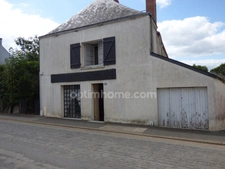 Maison centre-bourg 3/4 chambres + garage +  terrasse/jardinet