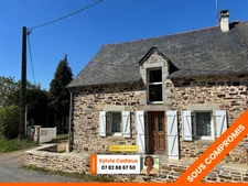 Maison en pierre avec garage sur terrain de 1 540 m²-4 chambres -Bains sur Oust