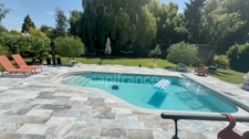 SAINT-DENIS-EN-VAL, ten minutes from Orléans, for sale: superb contemporary house with a 1000m² garden offering complete privacy, a heated swimming pool, and an attached garage.