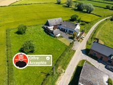 Maison avec grange et fort potentiel dans un environnement calme avec 3 000m² de terrain