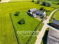 Maison avec grange et fort potentiel dans un environnement calme avec 3 000m² de terrain